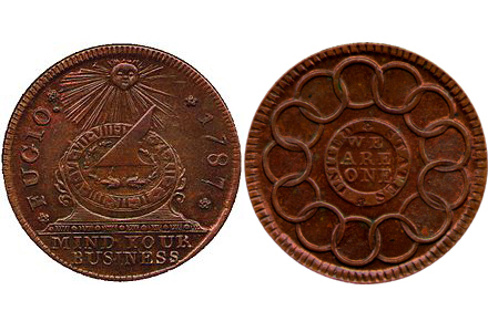 What was the motto on the first penny made?